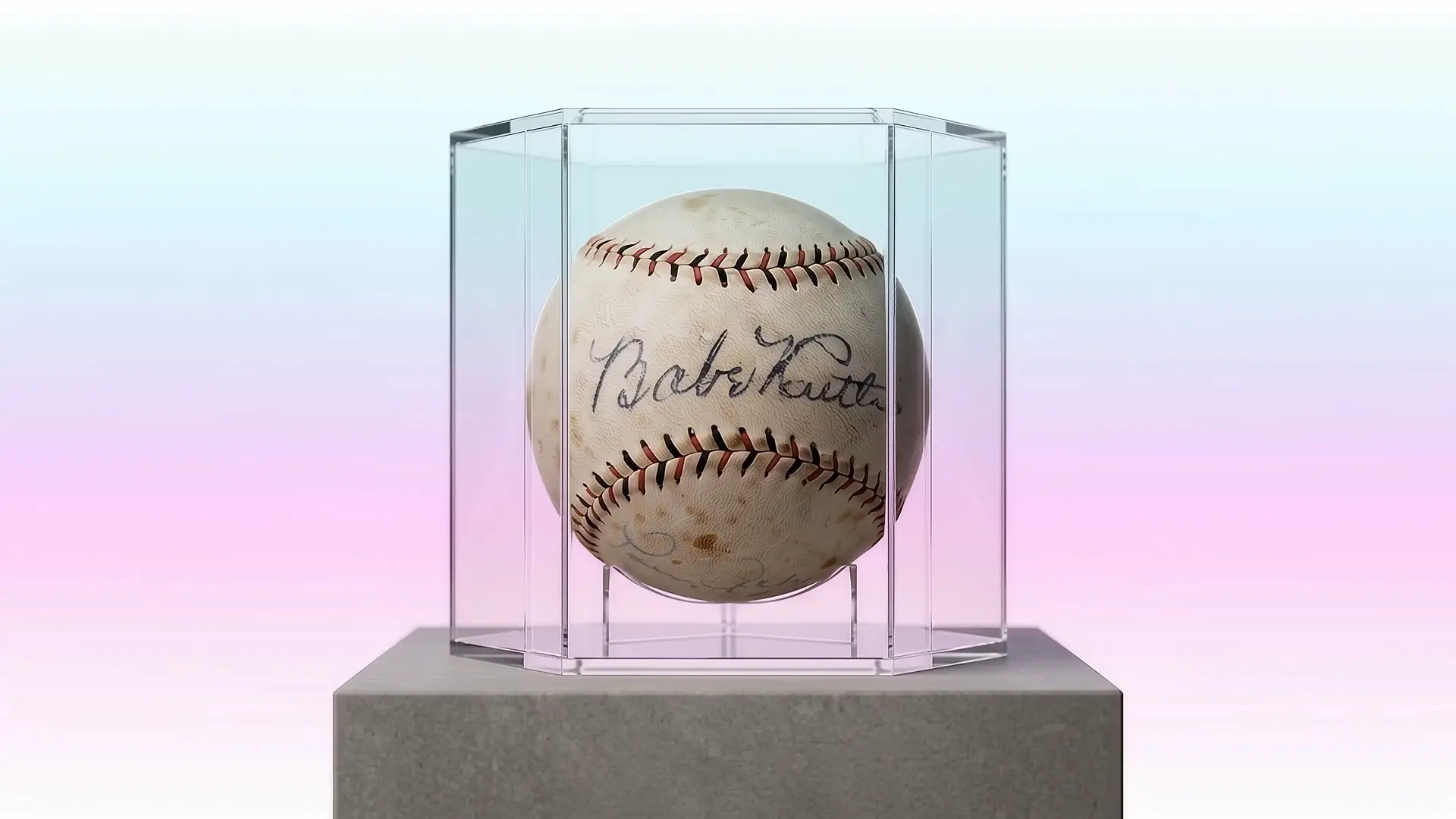 Signed baseball inside an acrylic display case